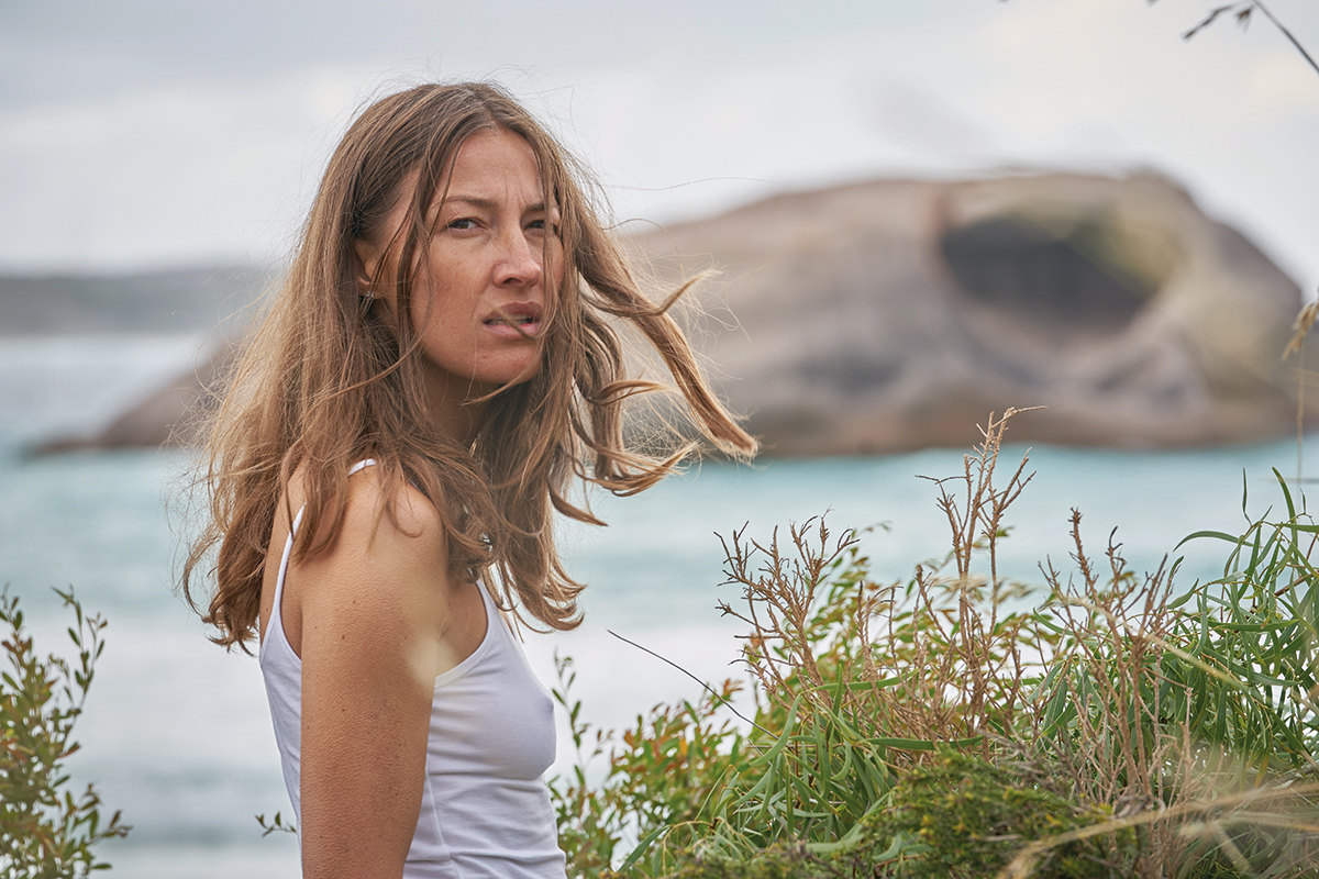 Georgie Jutland (Kelly Macdonald) at the beach in White Point. Location: Twilight Beach, West Beach. Credit: Kerry Brown